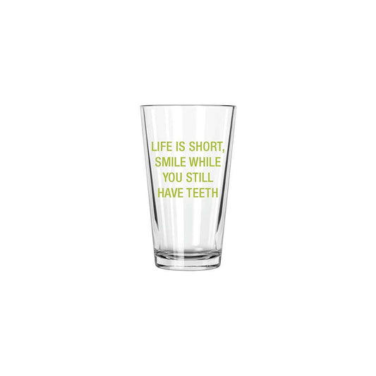 Life is short, smile while you still have teeth. Pint Glass